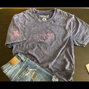 DJ Khalid concert t-shirt.